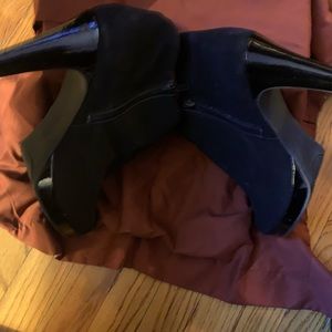 Black faux suede and patent leather platform booties. Size 11.
